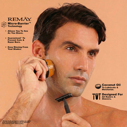 Man shaving with a razor, featuring REMAY Heat shaving cream product details on a peach background.